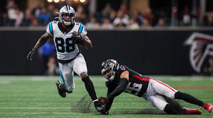 Oct 30, 2022; Atlanta, Georgia, USA; Carolina Panthers wide receiver Terrace Marshall Jr. (88) runs past Atlanta Falcons cornerback Isaiah Oliver (26) in the second half at Mercedes-Benz Stadium.